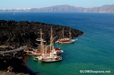 Postcard Santorini - boats at the new volcano
