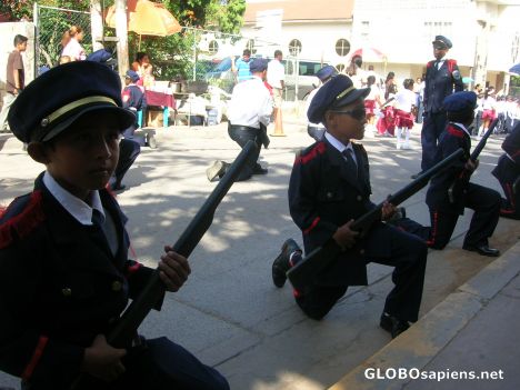 Postcard Boys holding weapons