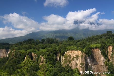 Postcard Merapi volcano enshrouded in clouds