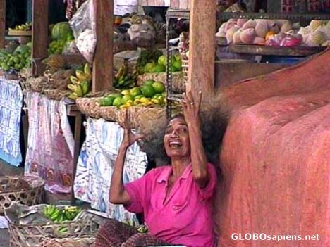 Postcard Lovina, seller on the market.