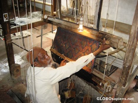 Postcard Weaver plies his trade on Vintage Loom