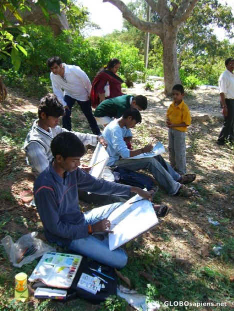 Postcard Artists at work atop a hill to paint the Nandi