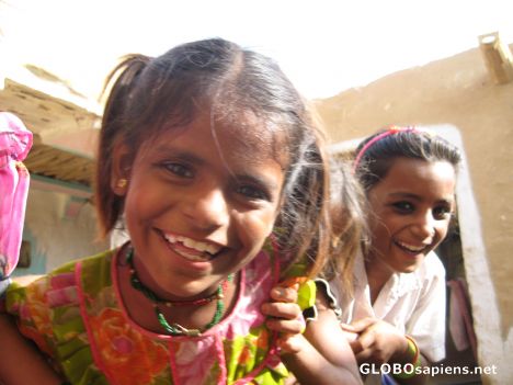 Postcard Smiling girl in the dessert...