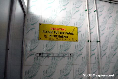 Postcard important note in the bathroom
