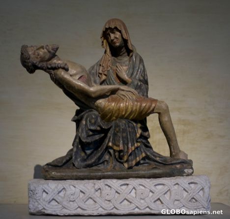 Postcard Sculpture in wood inside the Basilica of Aquileia.