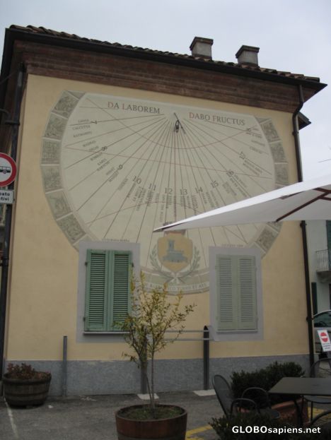 Postcard Sun-dial on a house in Barbaresco