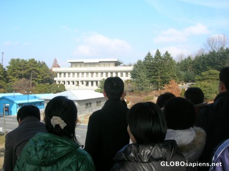 Postcard South Koreans take pictures of North Korea