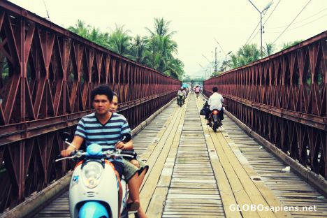 Postcard crossing a river