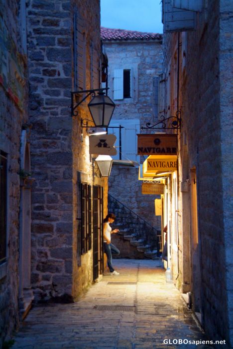 Postcard Budva (ME) - a shop assistant