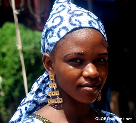 Postcard Nice young lady in th market
