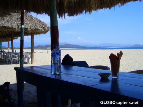 Postcard Under a palapa in Chacaua