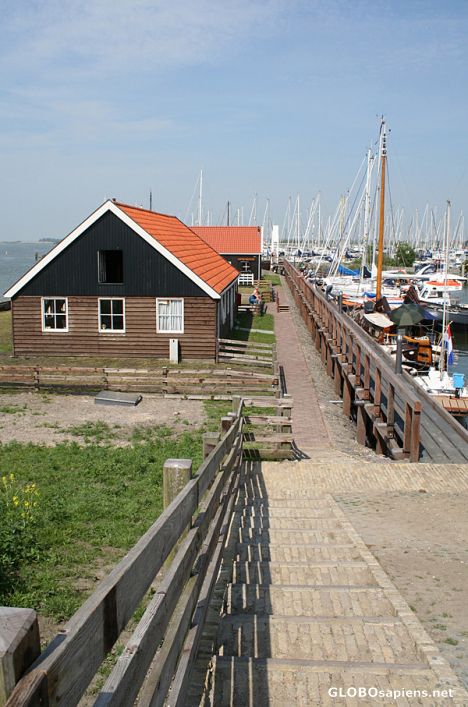 Postcard traditional wooden houses near the marina