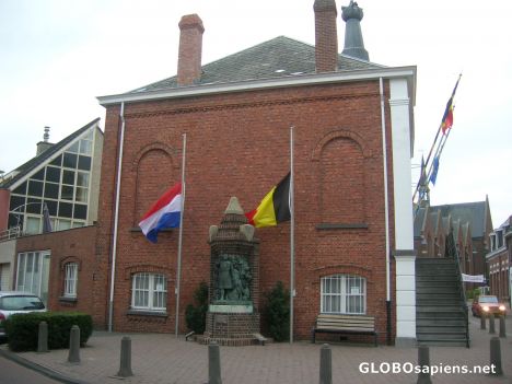 Postcard Two flags for a same city