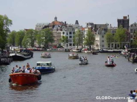 Postcard boats, canals, and houses oh my