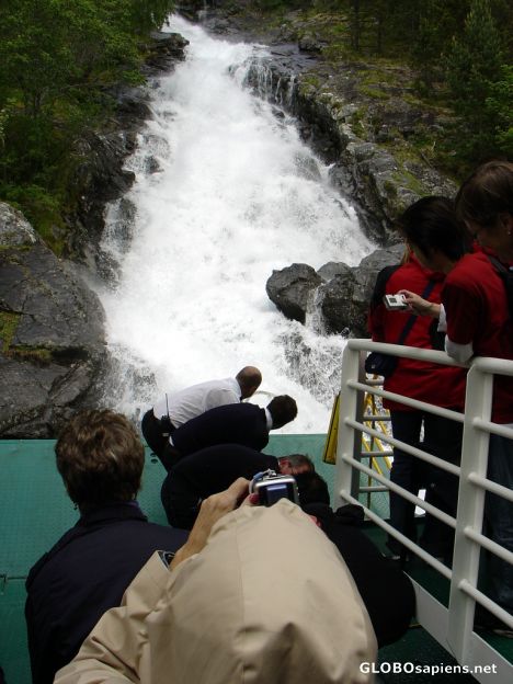Postcard drinking fresh water from a mountain