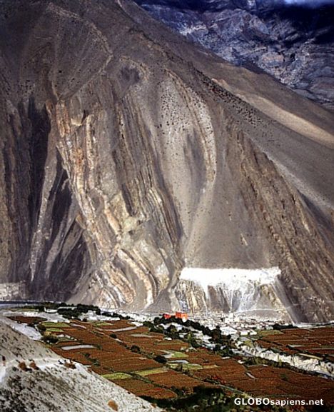 Postcard Kagbeni between towering Mountains and buckweat