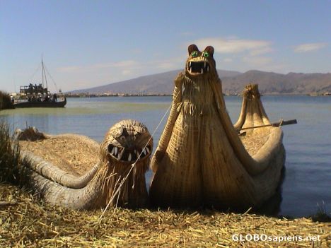 Postcard Artistic looking boat made of reed