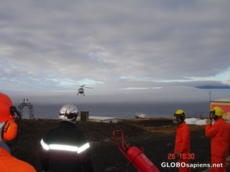 Postcard French Antarctica. Our helicopter is coming