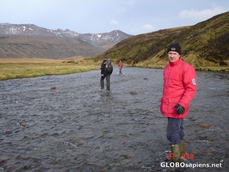 Postcard French Antarctica. Crossing a river in Kerguelen