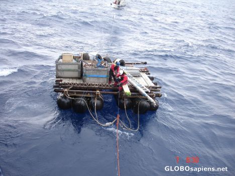 Postcard Heavy cargo being carried by rafts