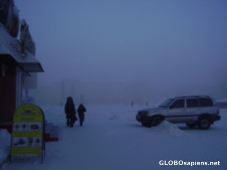 Postcard Horrible cold in Yakutia, few people in the street