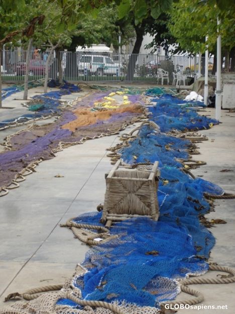 Postcard Fishing nets in the port
