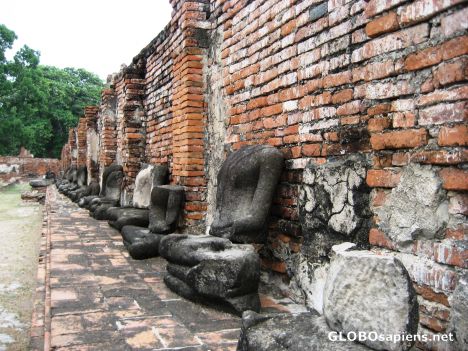 Postcard A row of desecrated and headless Buddhas