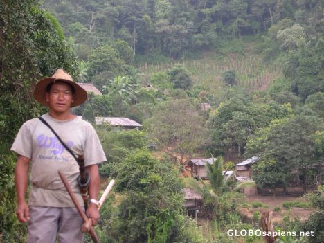 Postcard A proud chief welcomes you to his village