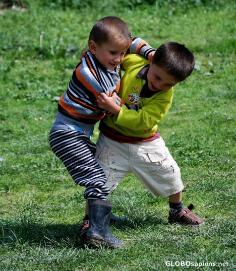 Postcard little boy wrestling