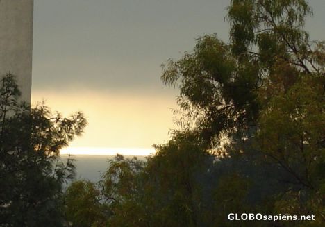 Postcard golden peace between darkness