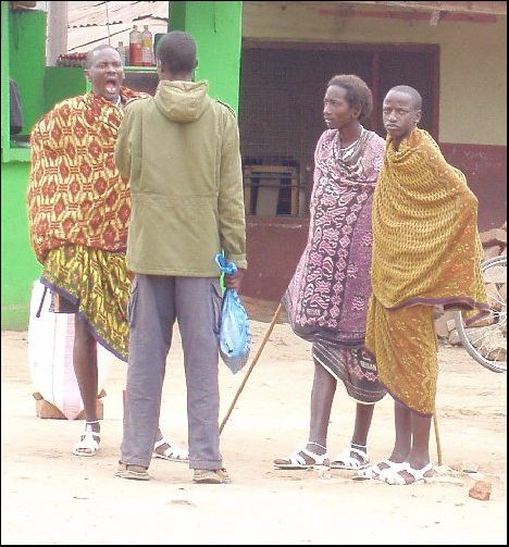 Postcard Members of the Maasai tribe at the bus stop