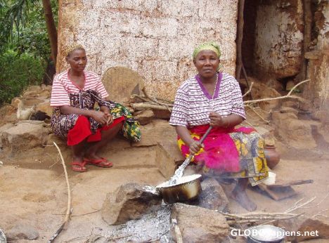 Postcard women preparing ugali
