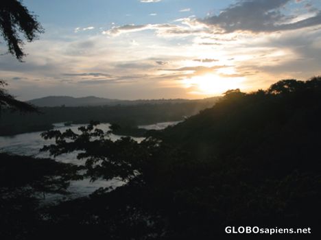Postcard Sunset over the source of the Nile.