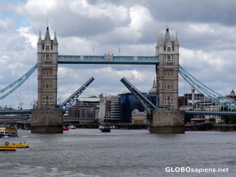 Postcard Tower Bridge opening seen from The River Thames