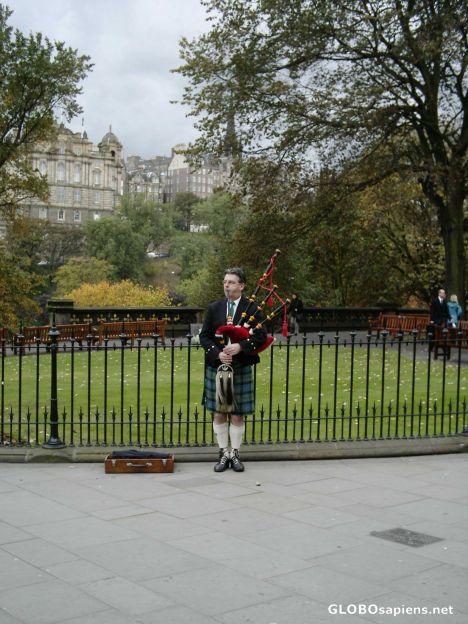 Postcard Playing the Bagpipes