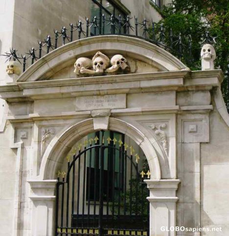 Postcard St Olave skulls door