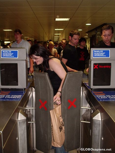 Postcard stuck at a underground train checkout
