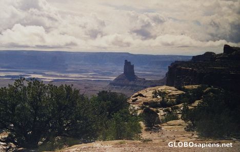 Postcard Dark clouds over canyonlands