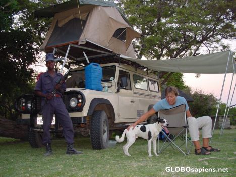 Postcard Armed guard at campsite