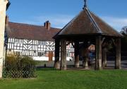 The Goats Head & Ancient Buttercross from the Village Green The Goats Head & Ancient Buttercross from the Village Green