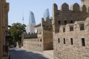 Old town city walls and the Flame Towers looming in the distance.