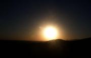 And it Rises! Peaking over the dune with a smiling face. And it Rises! Peaking over the dune with a smiling face.