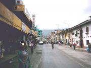 A street in Huaraz with a Semana Santa parade coming down the street. A street in Huaraz with a Semana Santa parade coming down the street.