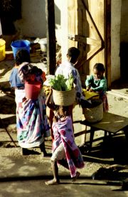 A shopgirl selling produce in Ranohira A shopgirl selling produce in Ranohira