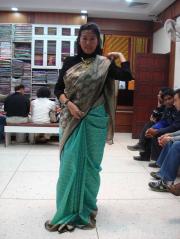 A happy tourist trying the sarees! And yes...she bought it!