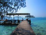 The island's jetty with the solar panels