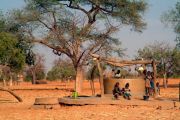 Dogon children at the well, collecting water and playing