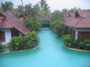 A view of the meandering pool villas