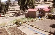 Rufino below his house