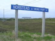 L’Anse aux Meadows and the sign “NORSTEAD: A Viking Port”.